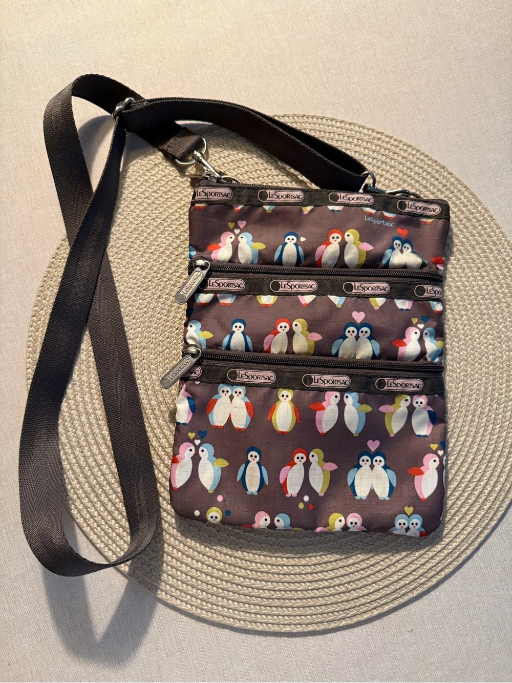 LeSportsac Brown Crossbody Bag with Multicolor Penguin Print